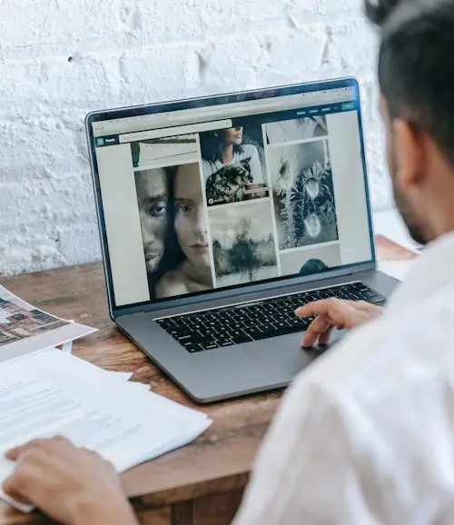 Man At Laptop At Desk